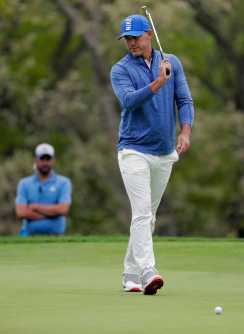 Brooks Koepka reacts after missing a putt on the fourth green during the second round of the PG ...