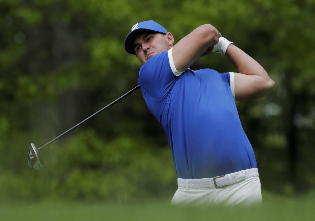 Brooks Koepka hits off the ninth tee during the second round of the PGA Championship golf tourn ...