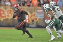 Cleveland Browns quarterback Baker Mayfield looks to pass during an NFL football game against t ...