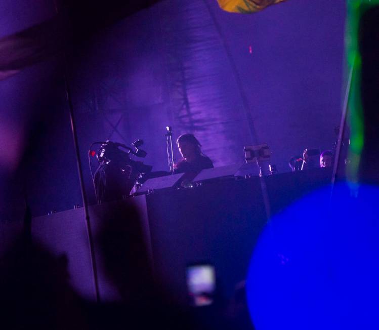 Skrillex performs during a surprise set at the Circuit Grounds stage during the second day of t ...