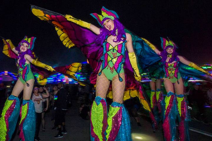 Electric Ladyland Stilt Walkers make their way down Rainbow Road during day two of Electric Dai ...