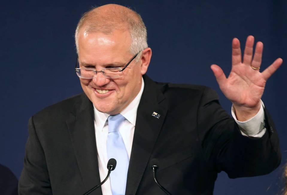 Australian Prime Minister Scott Morrison speaks to party supporters after his opponent concedes ...
