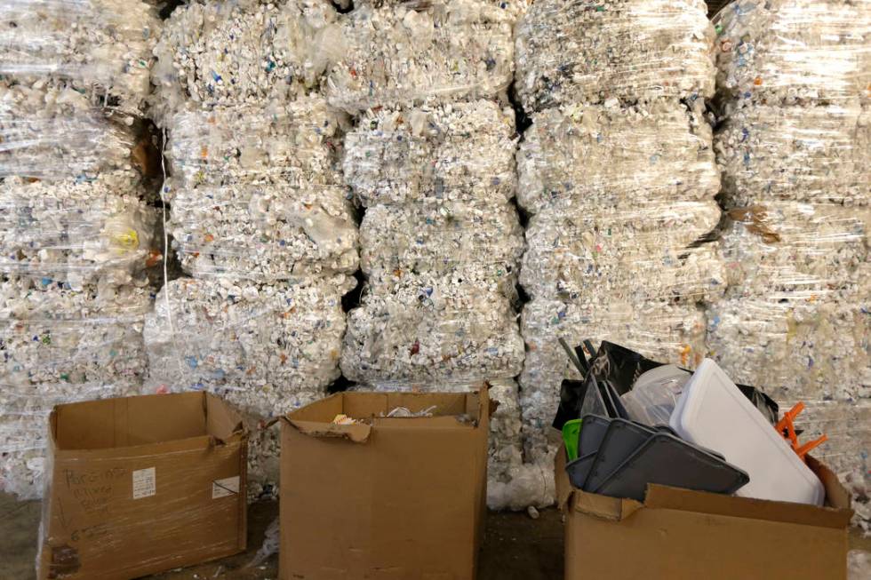 In this May 7, 2019 photo, plastic pill bottles are bundled for recycling at a GDB Internationa ...