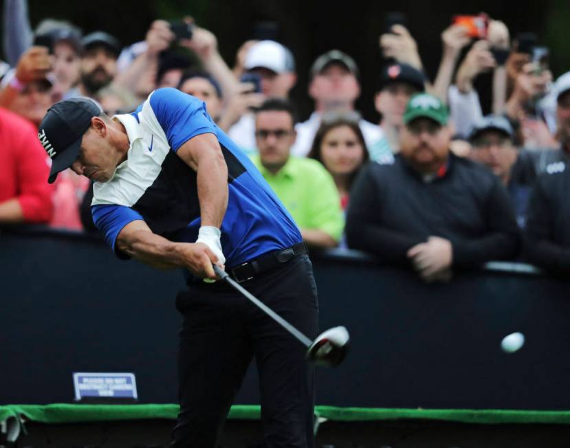 Brooks Koepka hits off the 16th tee during the final round of the PGA Championship golf tournam ...