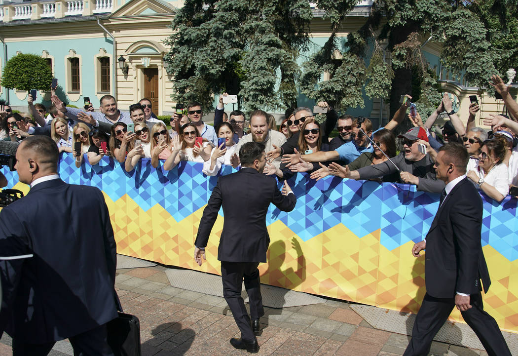 Ukrainian President-elect Volodymyr Zelenskiy greeds his supporters before inauguration ceremon ...