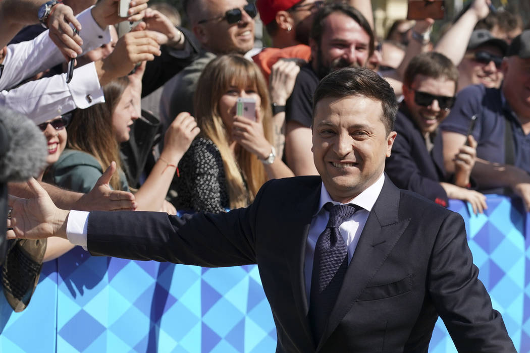 Ukrainian President-elect Volodymyr Zelenskiy greeds supporters before inauguration ceremony in ...