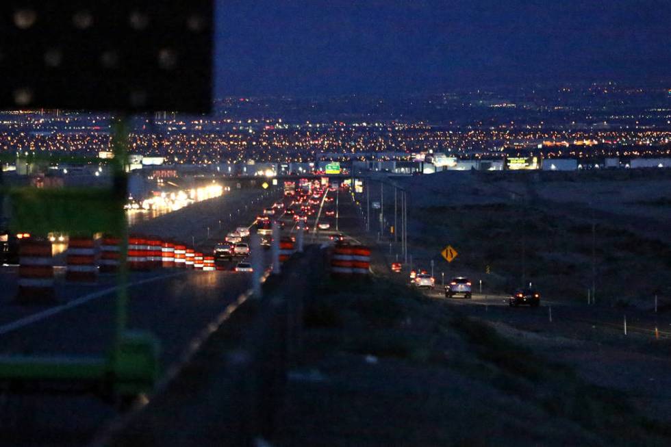 Thousands of EDC attendees leave the festival grounds at the Las Vegas Motor Speedway on Monday ...