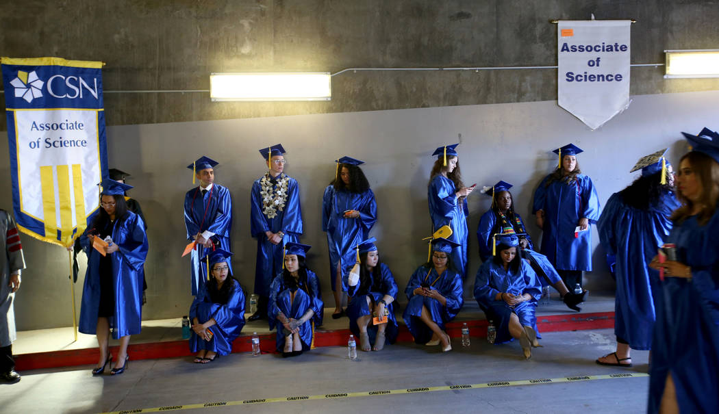 Graduates wait for the College of Southern Nevada commencement ceremony at Thomas & Mack Ce ...