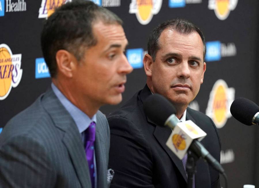 Los Angeles Lakers NBA basketball team general manager Rob Pelinka, left, introduces Frank Voge ...