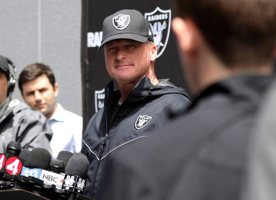 Oakland Raiders head coach Jon Gruden listens to media questions after an offseason training se ...