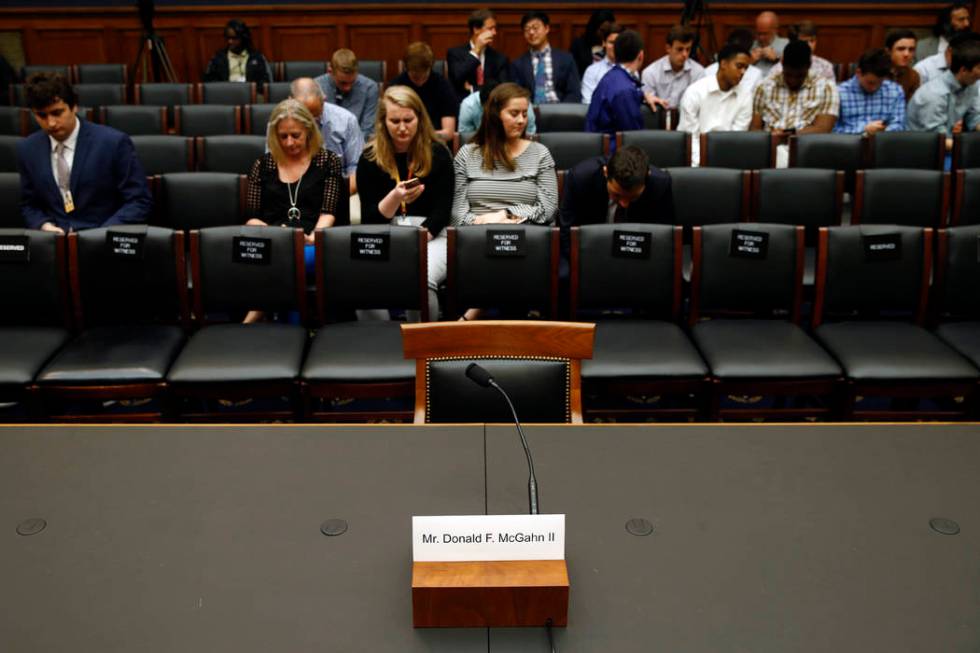 A name placard is displayed for former White House Counsel Don McGahn, who is not expected to a ...