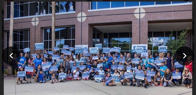 Parents and students rally to save Opportunity Scholarships at a rally outside the Grant Sawyer ...