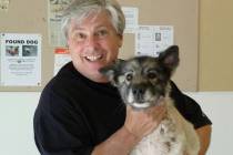 Harold Vosko poses with his late rescue dog, Grizzly. (Courtesy of Heaven Can Wait Animal Society)