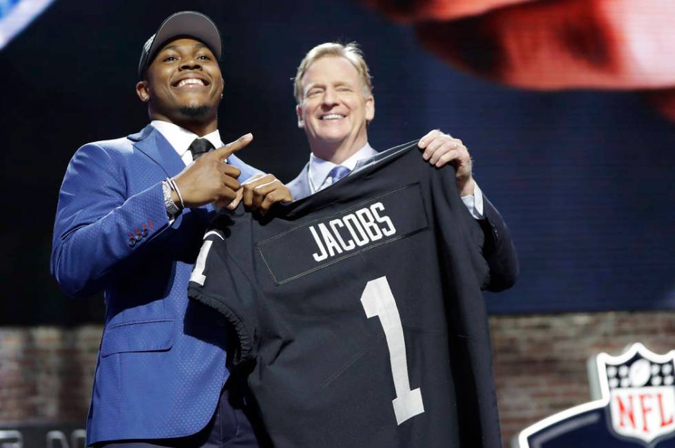 Alabama running back Josh Jacobs poses with NFL Commissioner Roger Goodell after the Oakland Ra ...