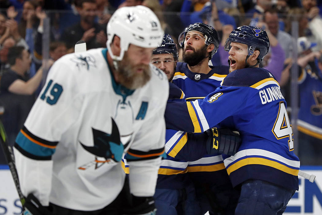 San Jose Sharks center Joe Thornton (19) skates past St. Louis Blues defenseman Carl Gunnarsson ...