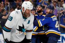 San Jose Sharks center Joe Thornton (19) skates past St. Louis Blues defenseman Carl Gunnarsson ...