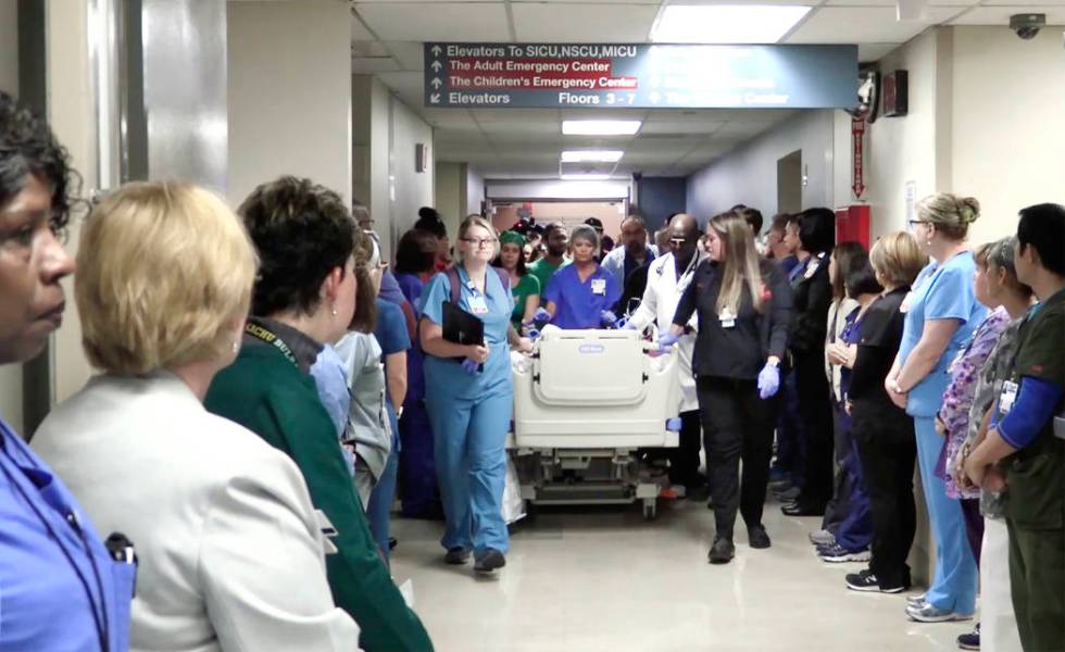University Medical Center staff holds donor walk for Michael Sigler on Wednesday, May 22, 2019 ...