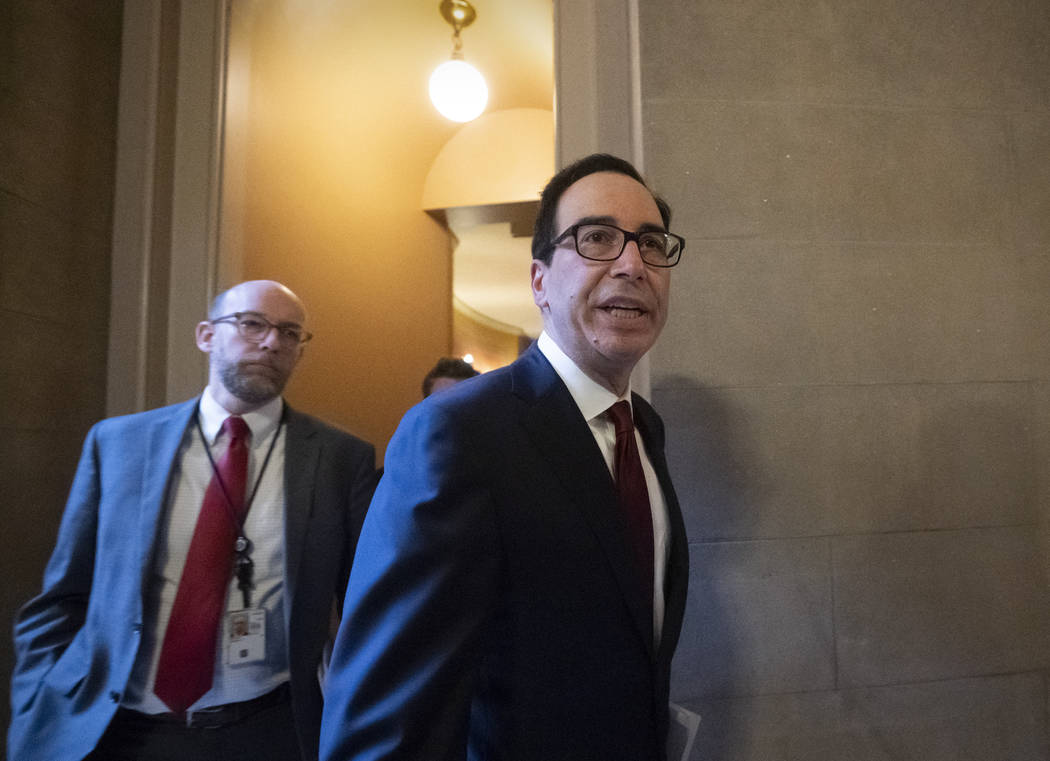 Treasury Secretary Steven Mnuchin leaves a meeting with top congressional leaders, including Sp ...