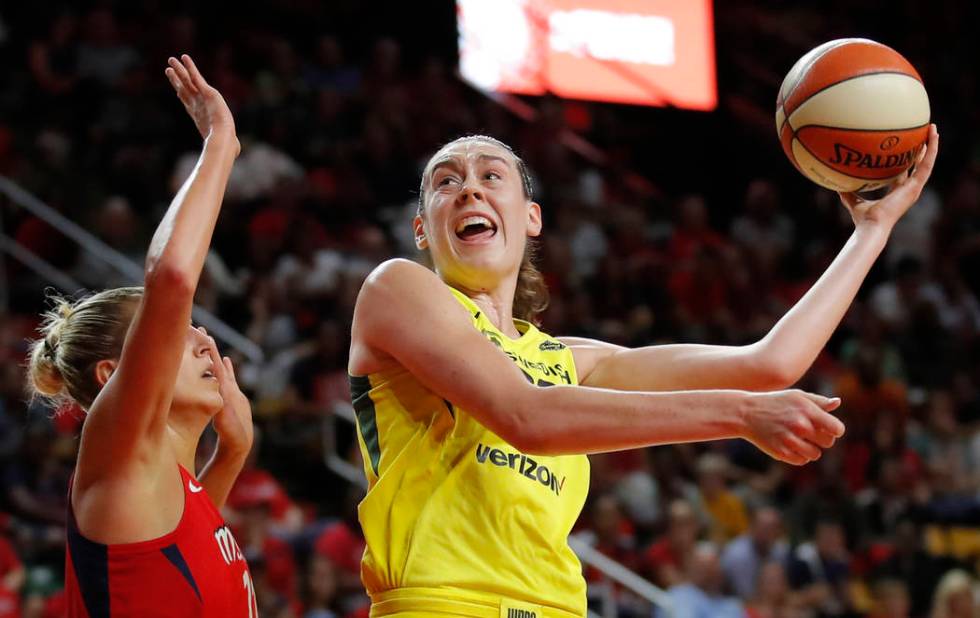 Seattle Storm forward Breanna Stewart (30) shoots as Washington Mystics forward Elena Delle Don ...