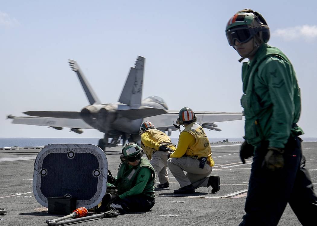 In this Monday, May 20, 2019 photo, released by U.S. Navy, an F/A-18E Super Hornet from the &qu ...