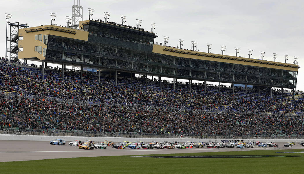 Drivers start the NASCAR Cup Series auto race at Kansas Speedway in Kansas City, Kan., Saturday ...