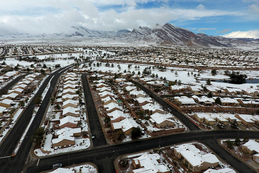Aerial photo of Summerlin homes after a winter storm dropped a blanket of snow on the west Las ...