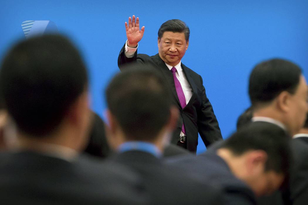 In a Saturday, April 27, 2019, file photo, Chinese President Xi Jinping waves as he leaves afte ...