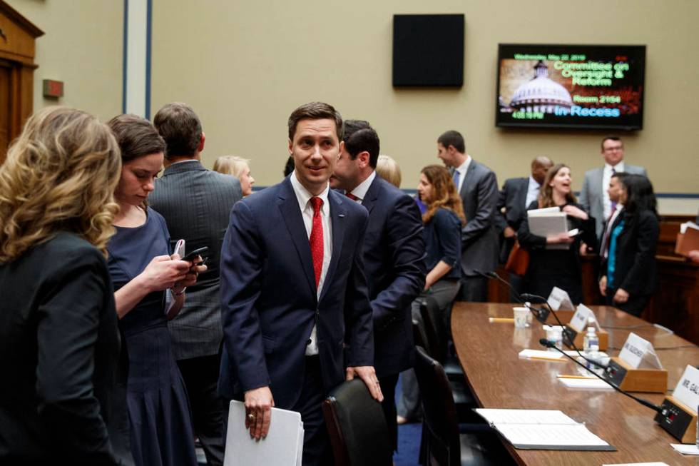 Twitter Public Policy Manager Kevin Kane walks from the hearing room during a break in testimon ...