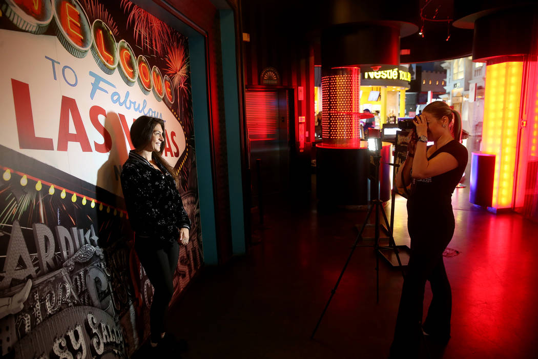 Coach Alison Scheel takes a "before" photo of Christi Ahnee of Las Vegas during a pre ...