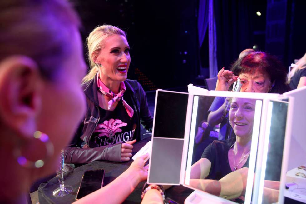 Coach Jennifer Jordan, center, works on makeup with Tammy Wadsworth of Henderson, left, and Git ...