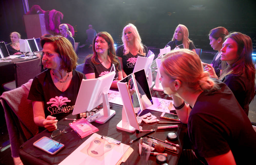 Coaches work with students during a preview of Showgirl Bootcamp at Saxe Theater in Miracle Mil ...