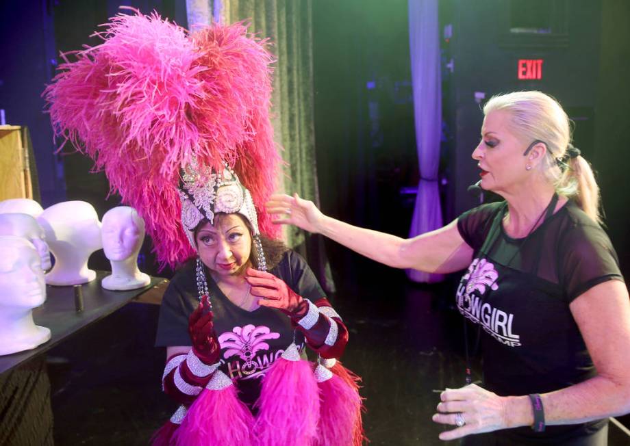 Co-creator Stacy Law-Blind, right, prepares Gita Saval of Las Vegas for her photo shoot during ...