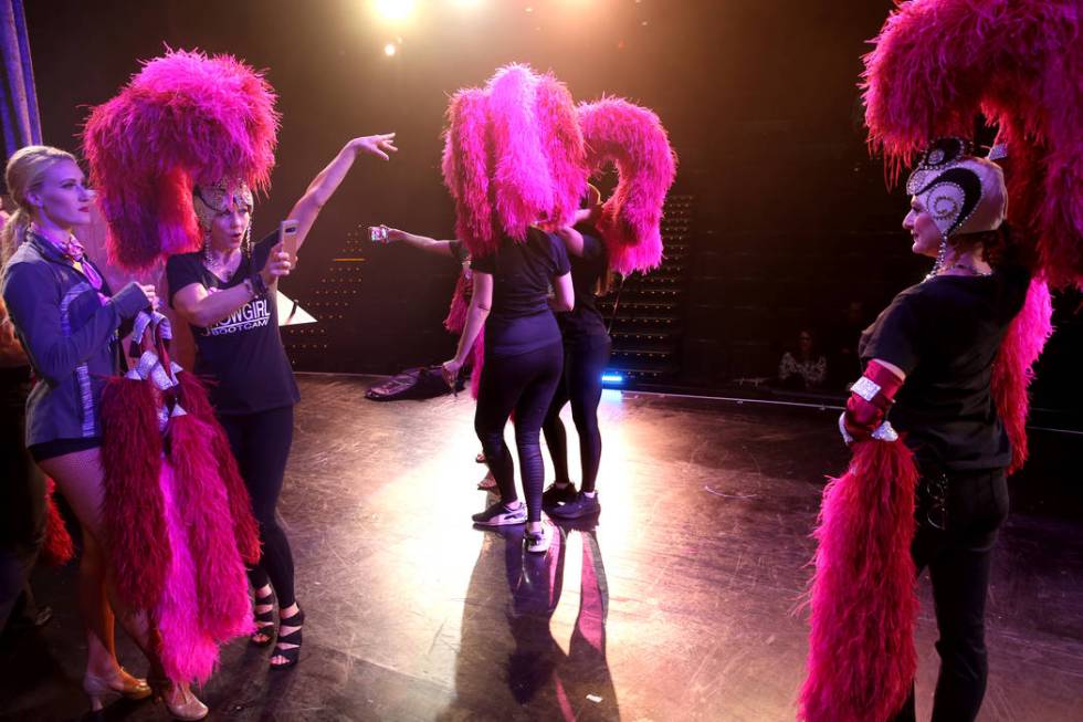 Tammy Wadsworth of Henderson, second from left, takes a photo of Marla Laughlin of Las Vegas du ...