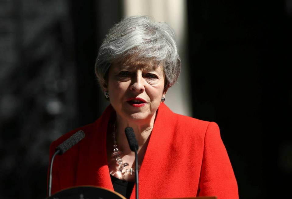 Britain's Prime Minister Theresa May makes a statement outside at 10 Downing Street in London, ...