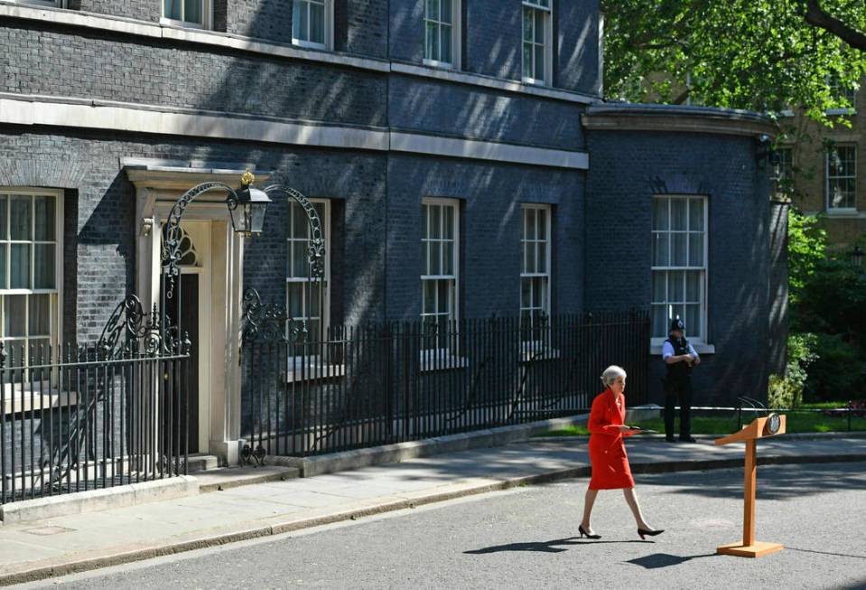 Britain's Prime Minister Theresa May arrives to make a statement outside at 10 Downing Street i ...