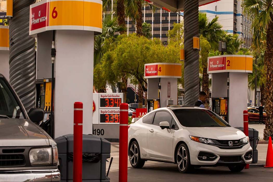 Drivers pump gas at the Shell station on E. Flamingo Road at Koval Lane in April in Las Vegas. ...