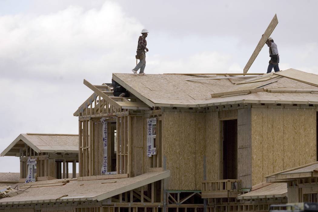 Construction workers build a home in Las Vegas. (Las Vegas Review-Journal)