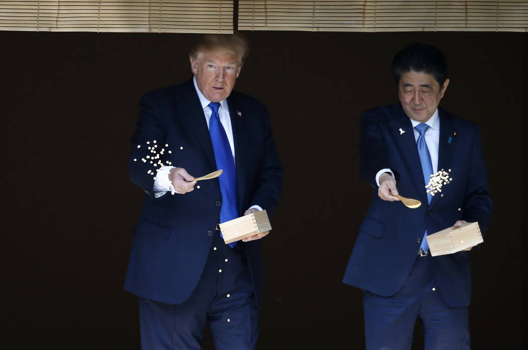 FILE - In this Nov. 6, 2017, file photo, U.S. President Donald Trump, left, and Japanese Prime ...