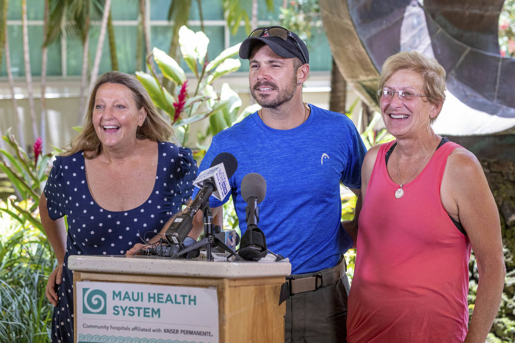 From left, Sarah Haynes, rescue lead Javier Cantellops, and Julia Eller, mother of Amanda Eller ...