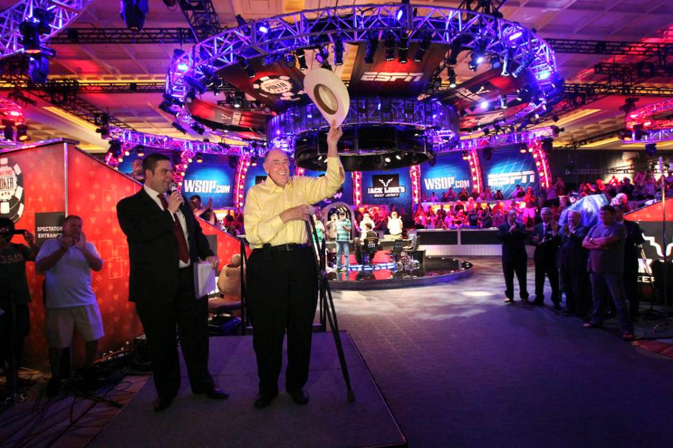 Tournament Director Jack Effel, left, introduces poker legend Doyle Brunson who announced "Shuf ...