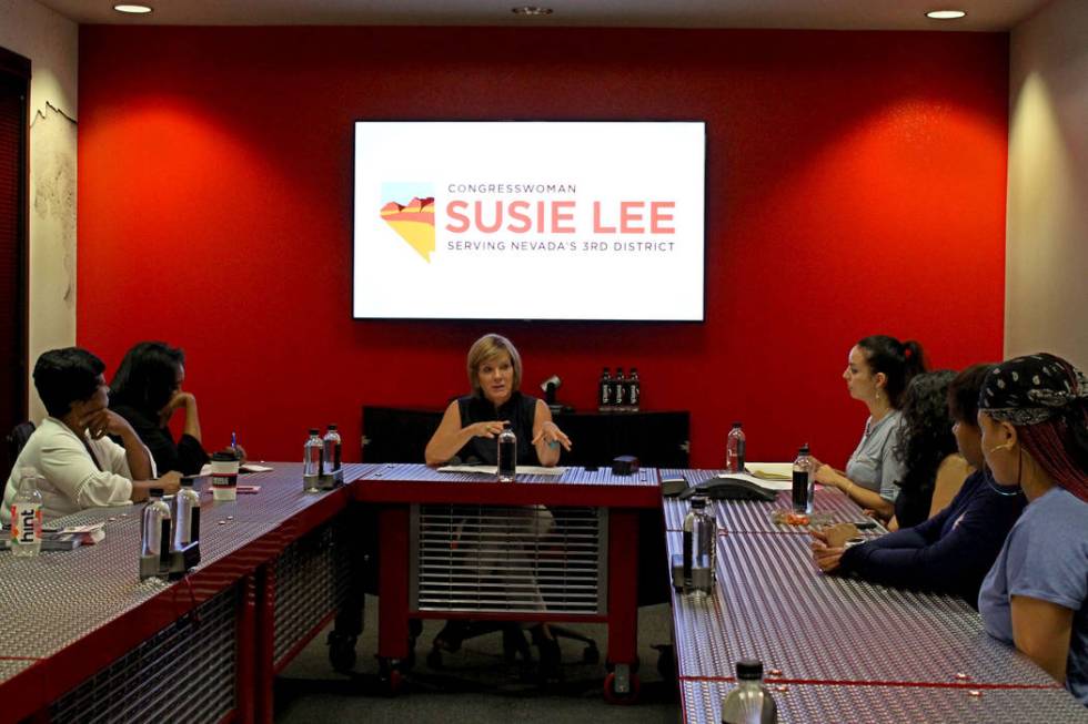 Rep.Susie Lee, D-Nev., center, speaks to women veterans at an informal roundtable at the Switch ...