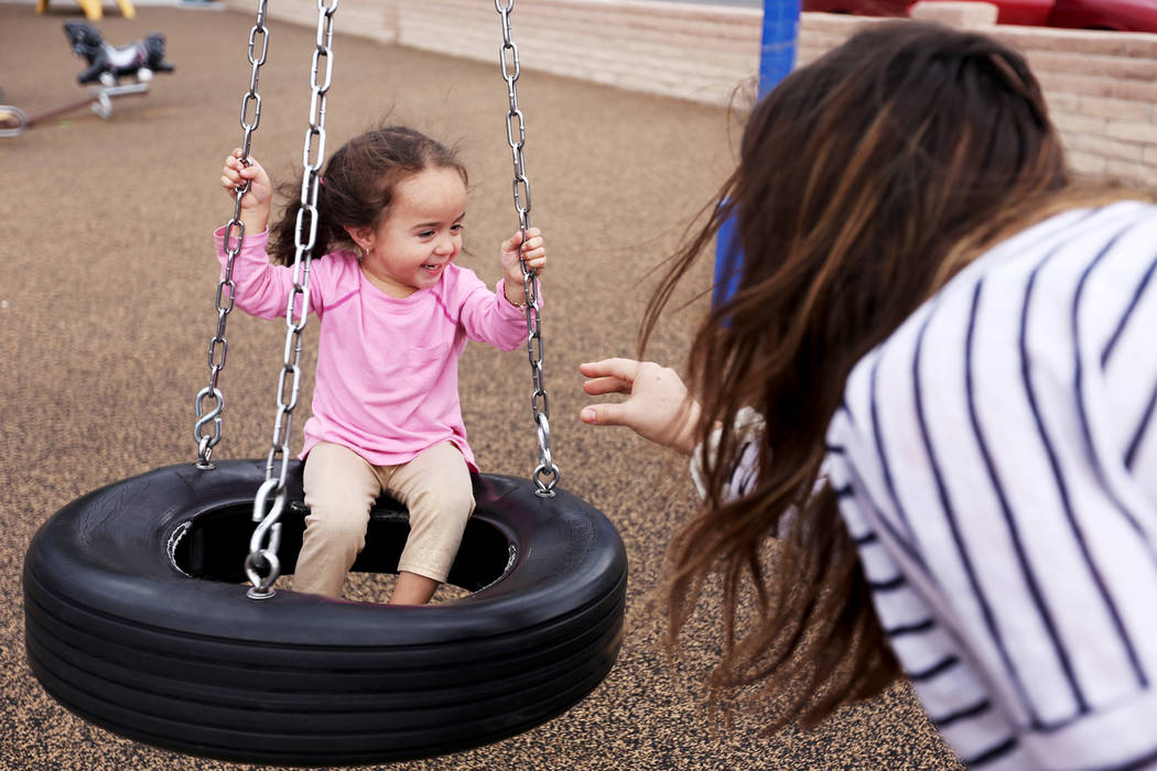 Michelle Reyes plays with her daughter Yhani Reyes, 2, at Bicentennial Park in Boulder City, Su ...