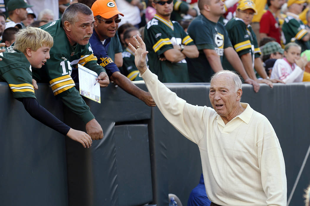 FILE - In this Sept. 10, 2012, file photo, former Green Bay Packers quarterback Bart Starr wave ...
