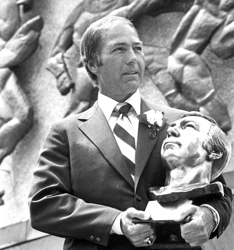 FILE - In this July 30, 1977, file photo, Bart Starr poses with his bust after his induction in ...