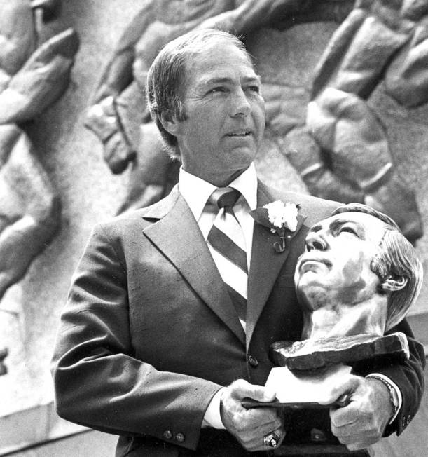 FILE - In this July 30, 1977, file photo, Bart Starr poses with his bust after his induction in ...