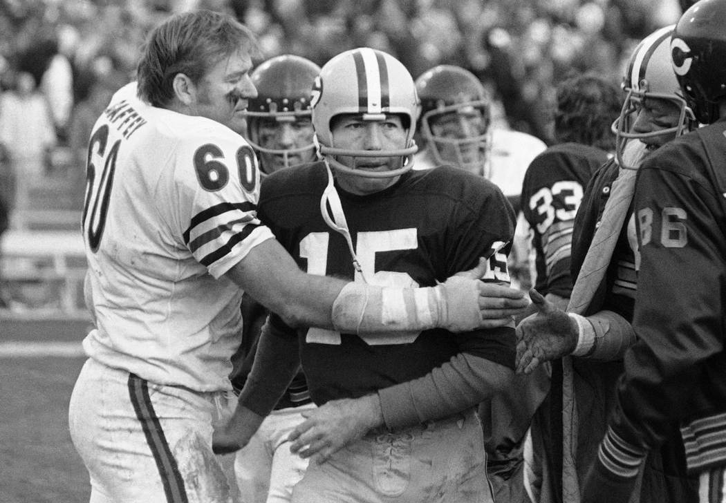 FILE - In this Nov. 16, 1970, file photo, Chicago Bears' Lee Roy Caffey (60) congratulates Gree ...