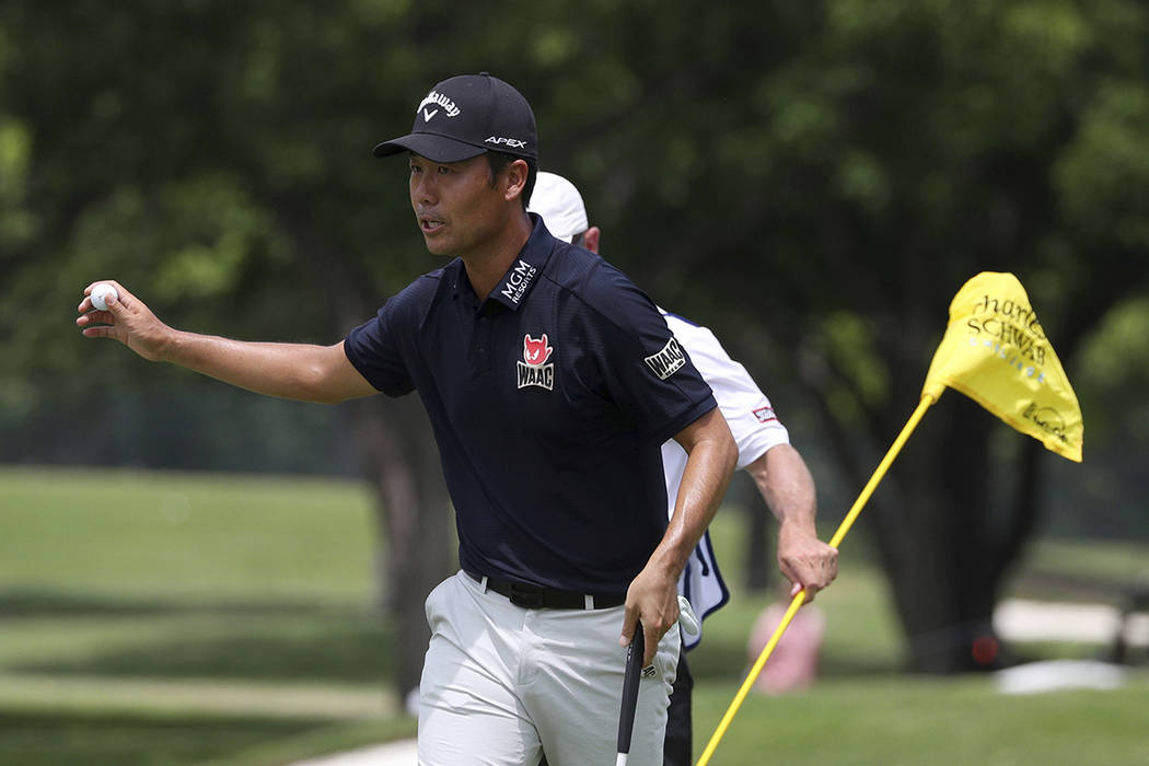 Kevin Na gestures after making a birdie on the sixth green in the final round of the Charles Sc ...