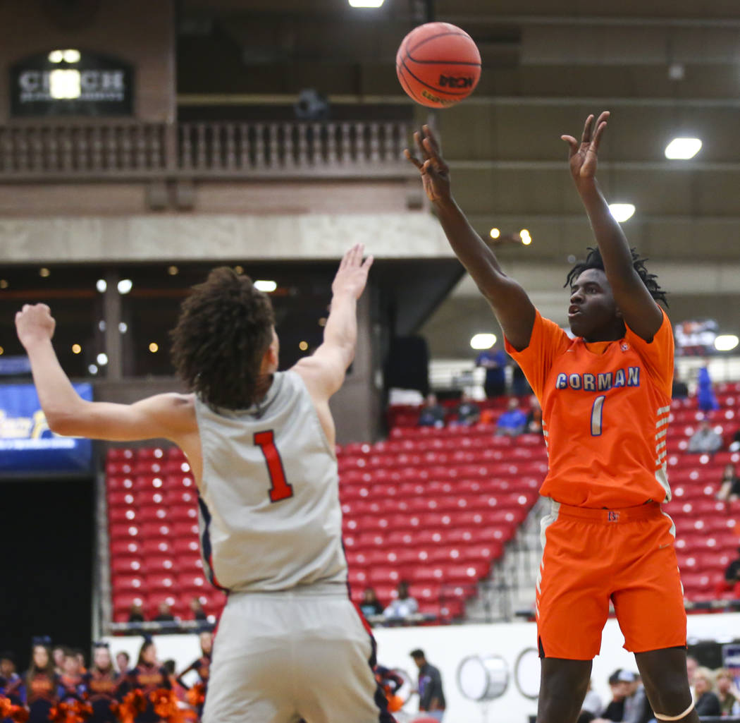 Bishop Gorman's Will McClendon (1) shoots over Findlay Prep's Blaise Beauchamp (1) during the f ...