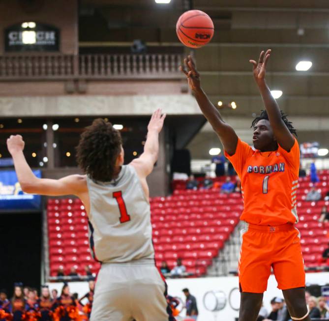 Bishop Gorman's Will McClendon (1) shoots over Findlay Prep's Blaise Beauchamp (1) during the f ...