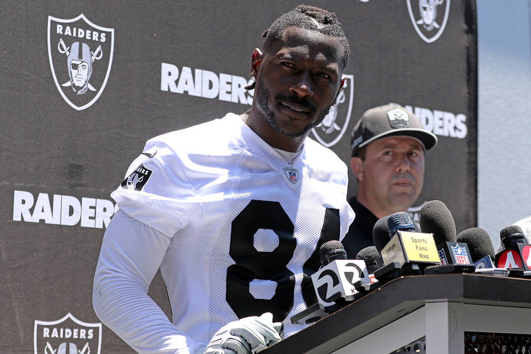 Oakland Raiders wide receiver Antonio Brown fields questions from reporters during a press conf ...